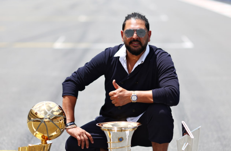 India legend Yuvraj Singh walks The Miami Grand Prix Grid with ICC Men’s T20 World Cup Trophy