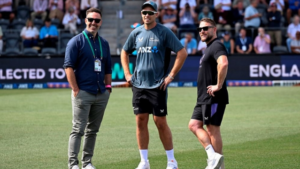 Bryan Stronach with Tim Southee and Brendon McCullum