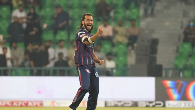 Hasan Ali celebrates after taking a wicket while playing for Karachi Kings during a T20 match.