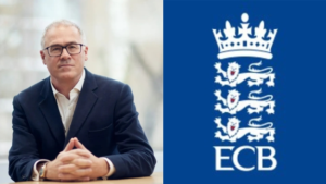 Richard Gould, CEO of the England and Wales Cricket Board (ECB), seated in a suit next to the official ECB logo featuring three lions and a crown.