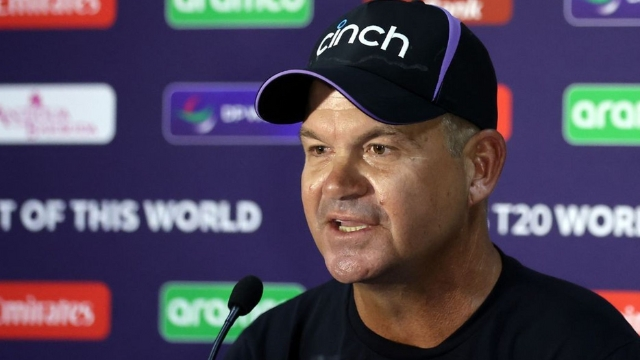Matthew Mott, WBBL head coach of Sydney Sixers, speaking at a T20 World Cup press conference wearing a Cinch cap