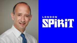 Portrait of Robert Lawson alongside the London Spirit cricket team logo on a blue background, representing the 2025 season.