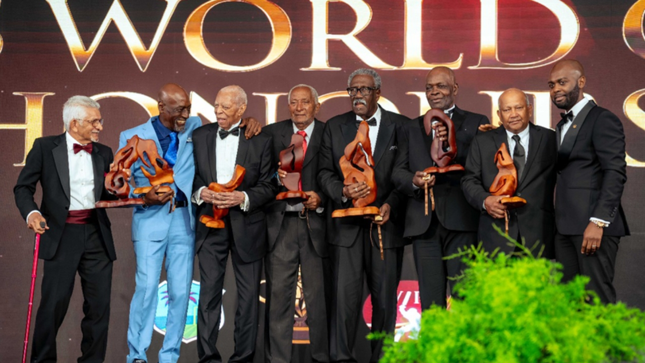 1975 Cricket World Cup legends receiving awards at the CWI and WIPA ceremony, alongside Kishore Shallow, posing with their trophies.