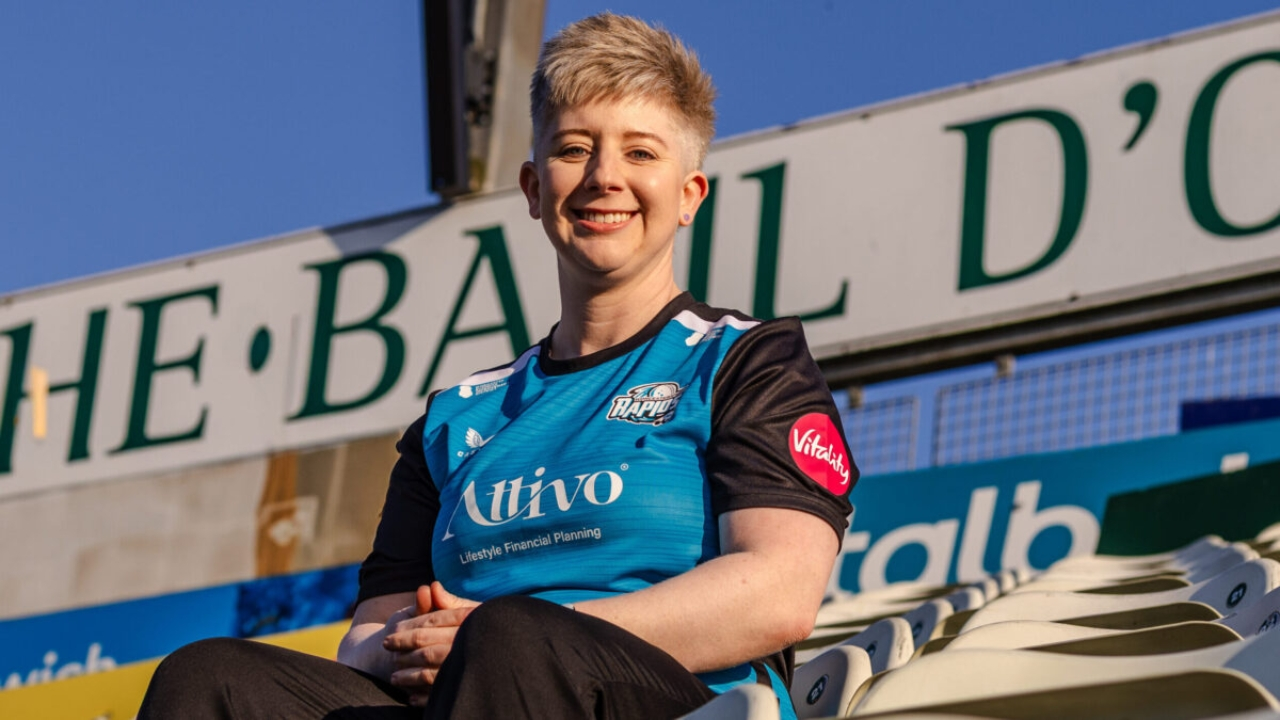 Clare Boycott, captain of the Worcestershire Women’s cricket team, smiling while seated in the stadium wearing the team jersey.