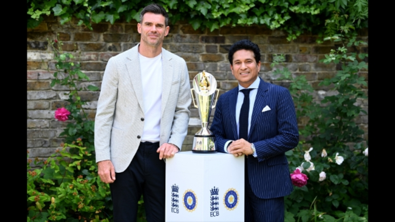 James Anderson and Sachin Tendulkar posing with the Anderson-Tendulkar Trophy, representing the England-India Test series, with ECB and BCCI logos on the pedestal.