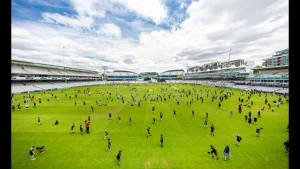 Children playing on the field at Lord's Cricket Ground during a fan engagement or kids’ day event, promoting youth involvement in cricket.