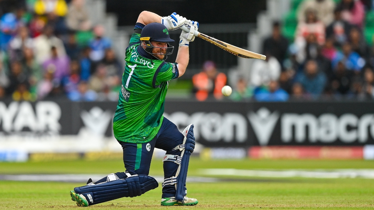 Paul Stirling of Ireland playing an attacking cricket shot during a match, captured mid-action.