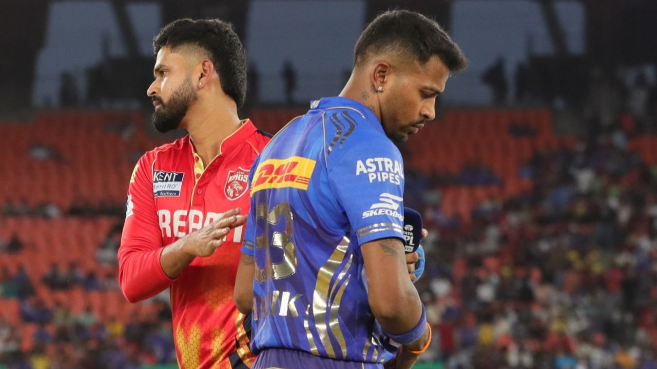 Shreyas Iyer and Hardik Pandya during a moment at an IPL 2024 match, with Iyer in Punjab Kings jersey and Pandya in Mumbai Indians kit.