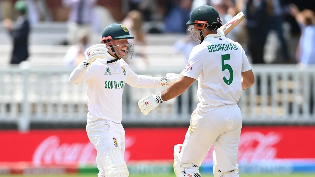 South African cricketers celebrating a win during the ICC World Test Championship 2025, with Kyle Verreynne and David Bedingham in jubilant scenes.