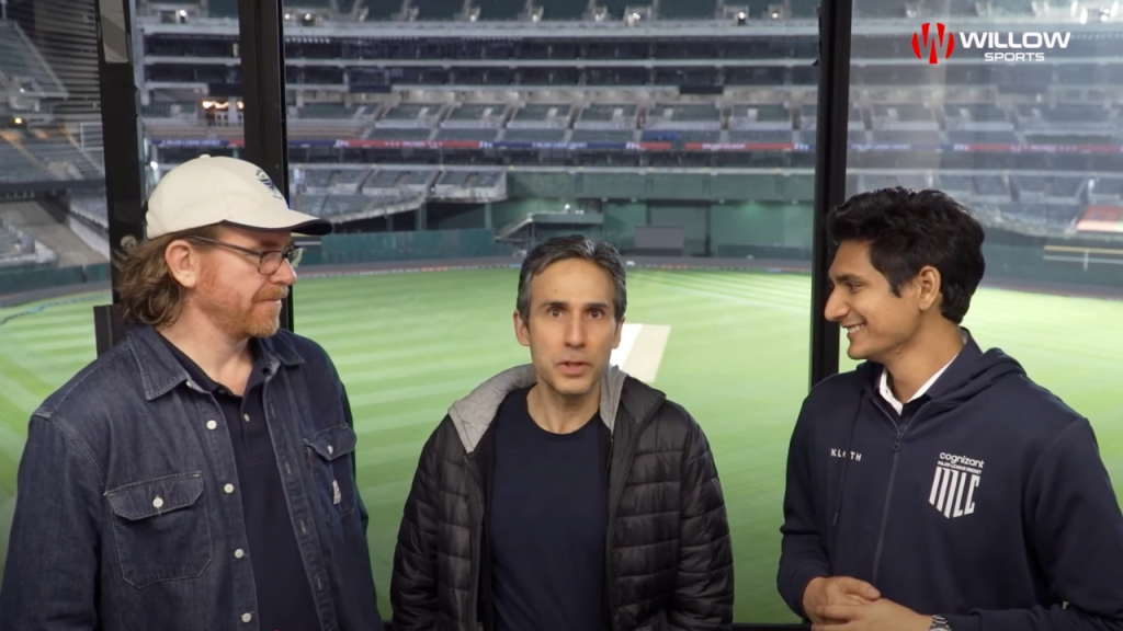 Aaman Patel, Emerging Cricket writer Nate Hays, and Cricexec founder Zee Zaidi standing together inside a stadium during a Willow Sports segment.