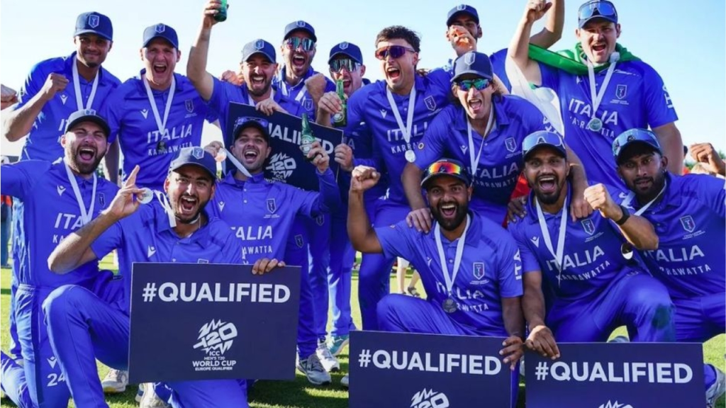 Italy cricket team celebrates qualification for the ICC Men's T20 World Cup, holding #Qualified signs and wearing medals.