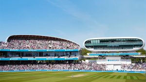 Wide-angle view of Lord's Cricket Ground showing packed stands and the iconic media centre under a clear blue sky.