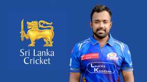 Charith Asalanka in a Mumbai Indians jersey standing beside the Sri Lanka Cricket logo on a blue background.
