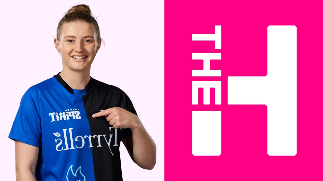 England cricketer Charlie Dean wearing a London Spirit jersey and pointing to the team logo, alongside The Hundred cricket tournament logo on a pink background.