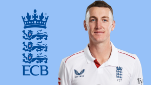 England cricketer Harry Brook in official Test jersey posing alongside the England and Wales Cricket Board (ECB) logo on a blue background.