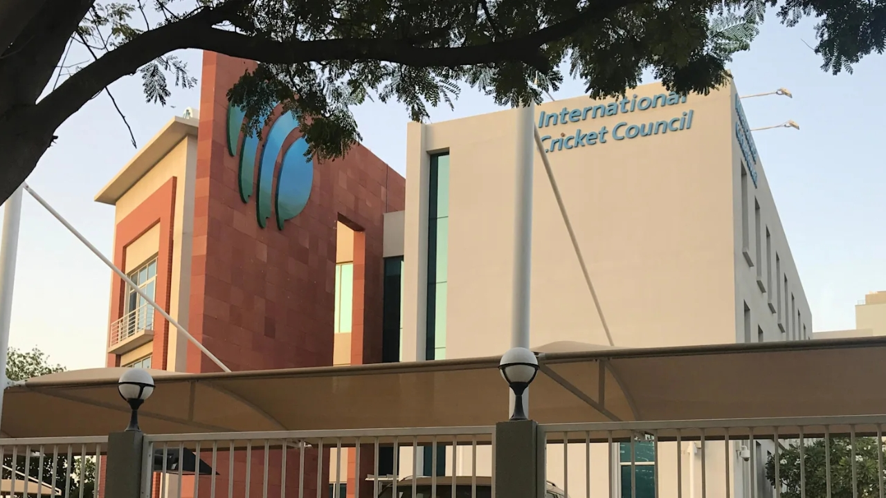 Exterior view of the International Cricket Council (ICC) headquarters building in Dubai, showcasing the ICC logo and modern architecture.
