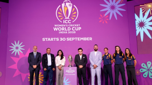 Jay Shah, Mithali Raj, Harmanpreet Kaur, Smriti Mandhana, Yuvraj Singh and other dignitaries at the launch event of ICC Women's Cricket World Cup 2025 with the tournament trophy on display.