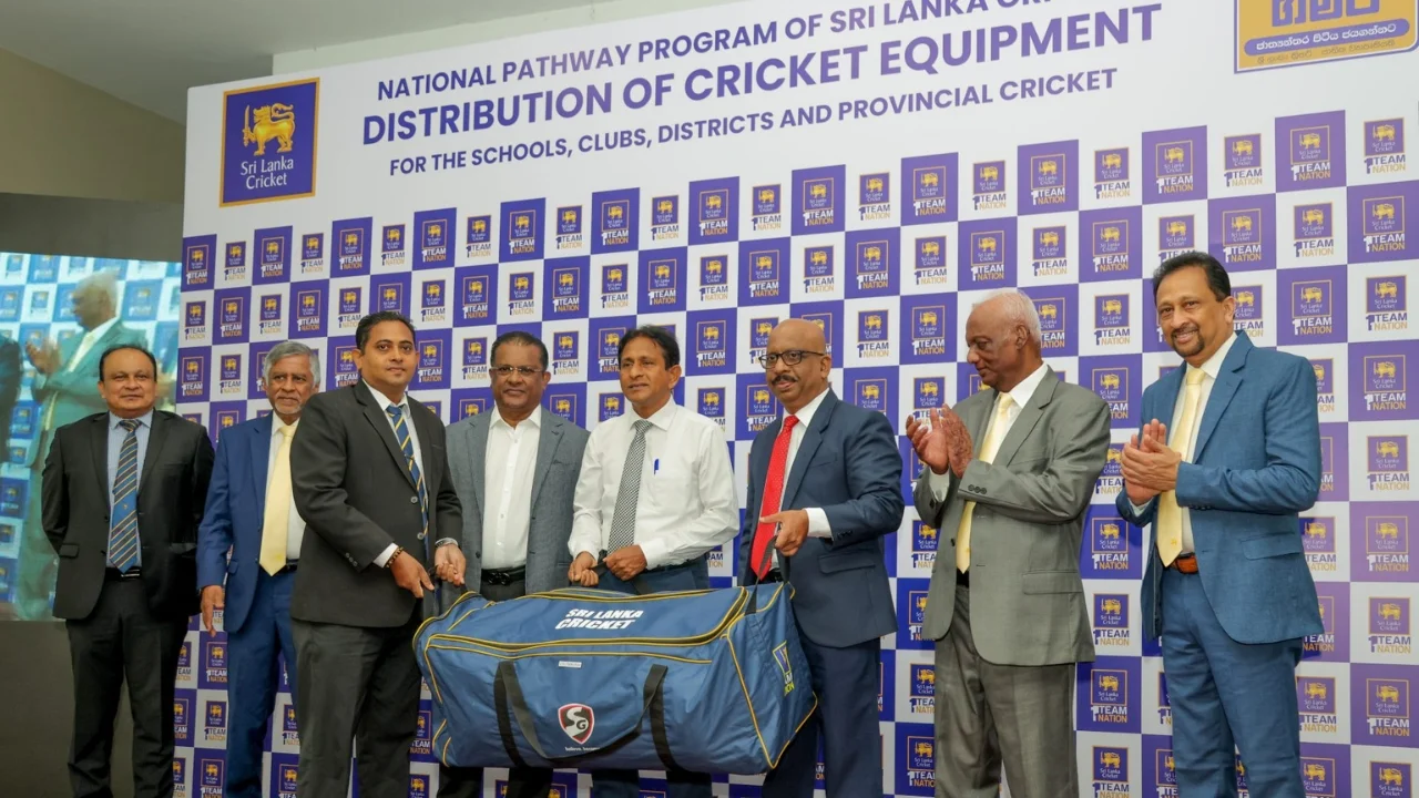 Officials from Sri Lanka Cricket at the National Pathway Program event, showcasing the distribution of cricket equipment to schools, clubs, and districts.