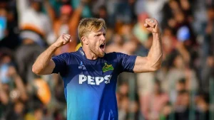 David Willey celebrates a wicket while wearing the Multan Sultans jersey during a Pakistan Super League (PSL) match.