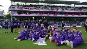 Northern Superchargers women's cricket team celebrate with The Hundred 2025 trophy after winning the final at a packed stadium