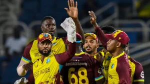 West Indies men's cricket team celebrating in ODI jersey during a match