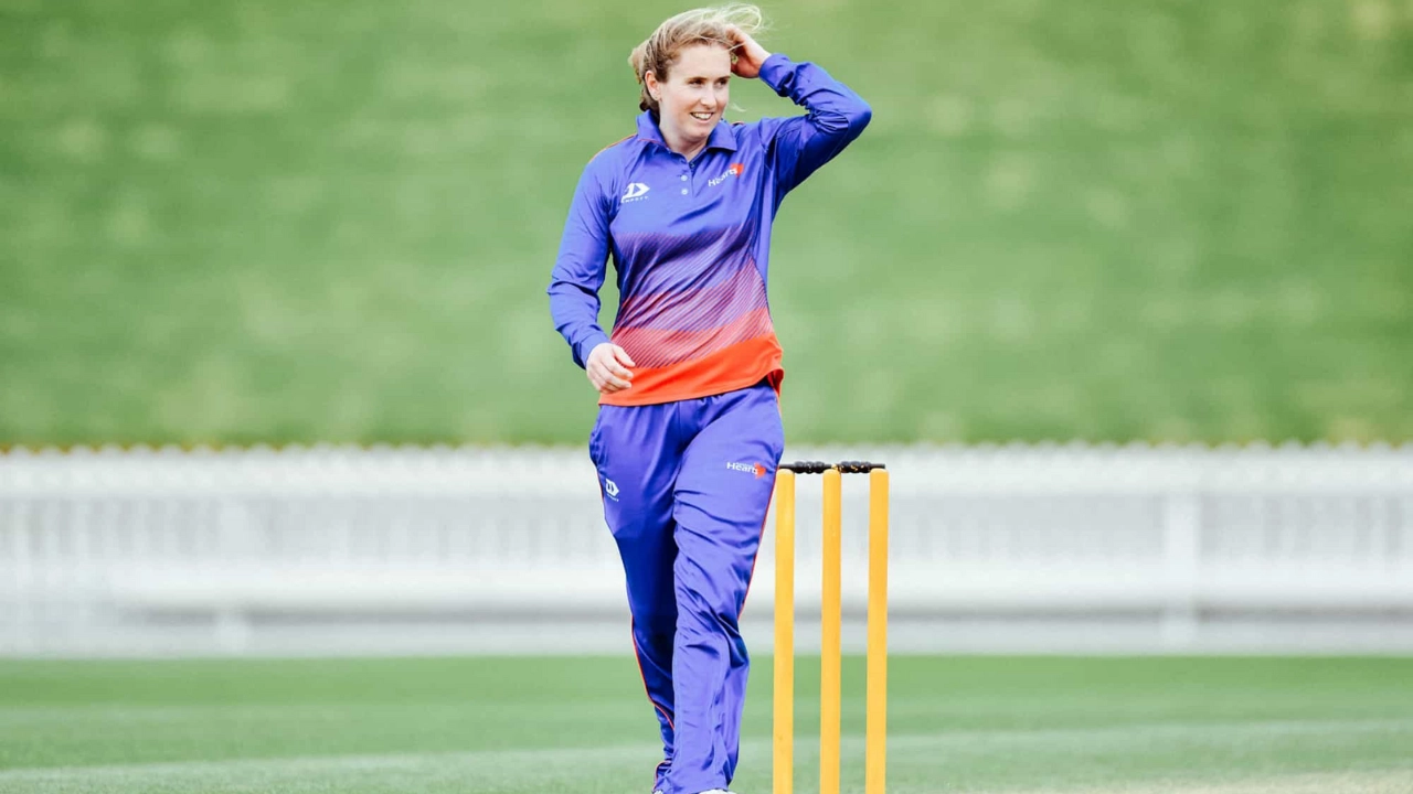 Anna Peterson during a women's cricket practice session wearing team training kit
