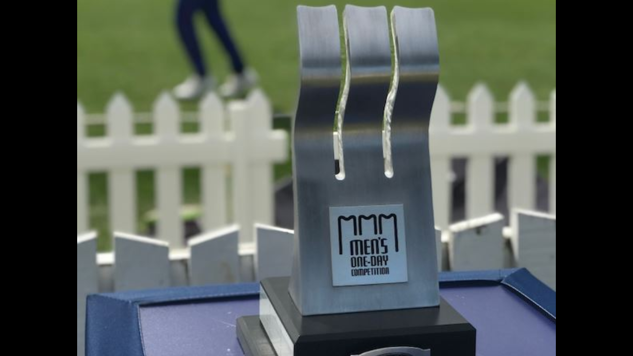 Ford Trophy awarded for New Zealand's Men's One-Day Competition placed on display in front of a white picket fence