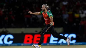 Imran Tahir celebrates passionately after taking a wicket during a CPL 2025 match, wearing Guyana Amazon Warriors team colors.