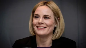 Portrait of Sarah Keane, CEO of Cricket Ireland, smiling during a media appearance.