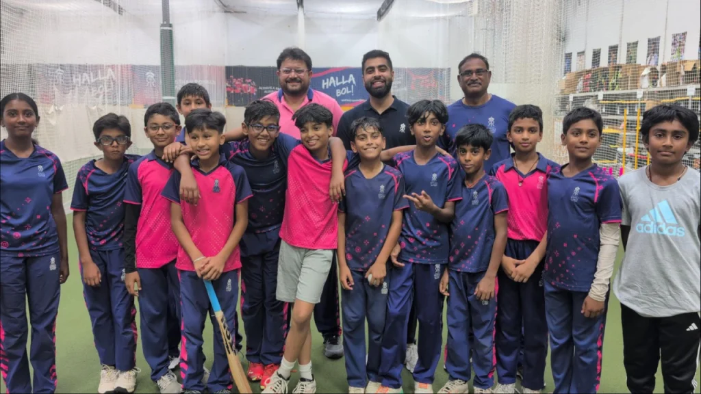 Sid Lahiri with Rajasthan Royals executives and young cricketers at the Royals Academy in New Jersey, USA