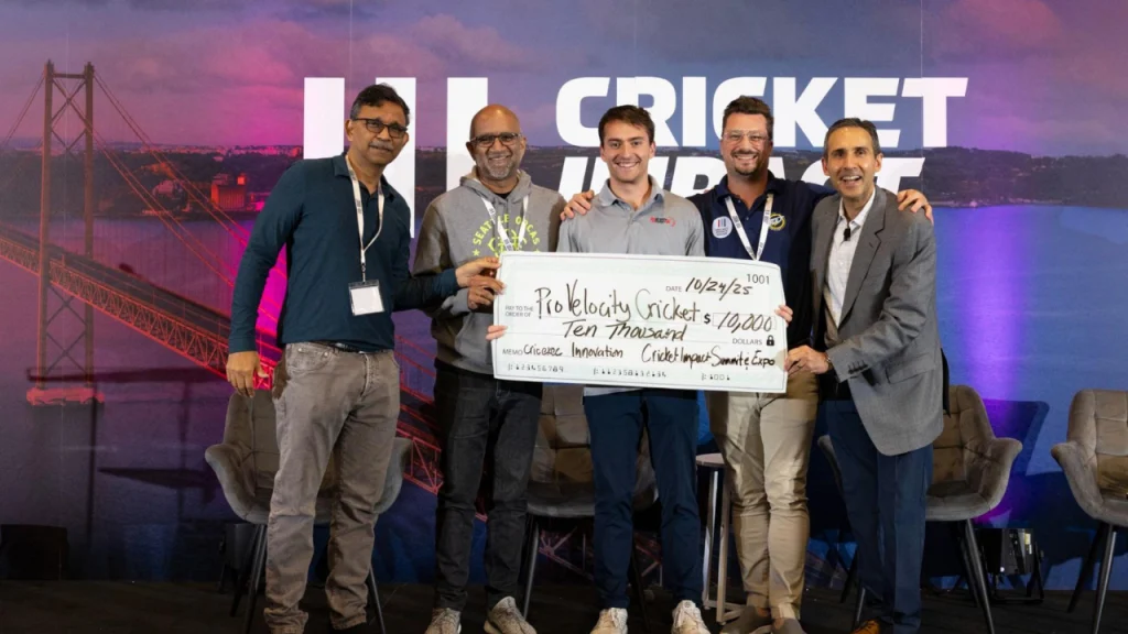 Venky Harinarayan, Sanjay Parthasarathy, Elijah Taitel, Adam Hall, and Zee Zaidi holding a $10,000 check at the Cricexec Innovation Cricket Impact Summit & Expo