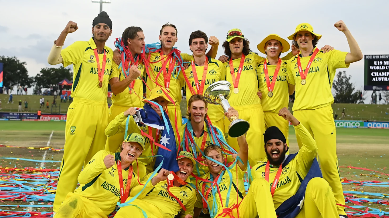 Australia U19 cricket team celebrating victory after winning the ICC U19 Men's Cricket World Cup 2024 with trophy and medals