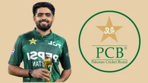 Babar Azam holding a trophy in Pakistan cricket jersey beside the Pakistan Cricket Board (PCB) logo.
