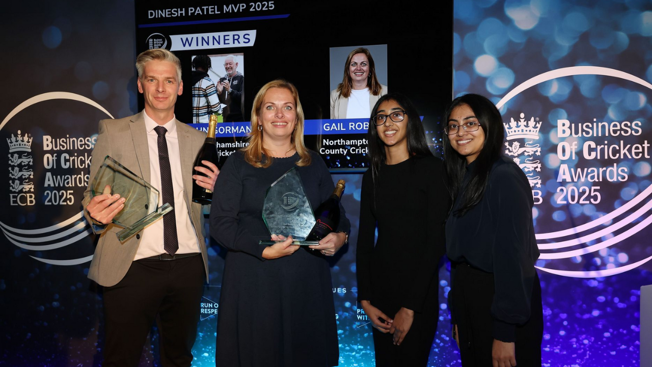 Group photo of Dinesh Patel MVP 2025 award winners at the Business of Cricket Awards, featuring honorees holding trophies in front of the event backdrop.