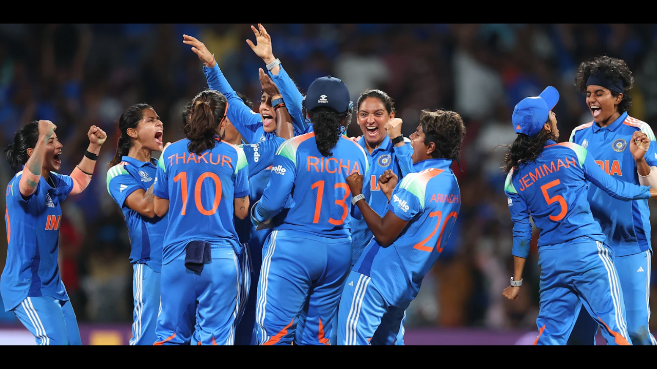 Indian women cricketers celebrate a key moment during the ICC Women’s Cricket World Cup 2025, showcasing unity and excitement.