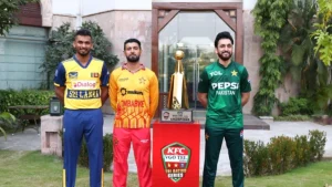 Salman Ali Agha, Sikandar Raza, and Dasun Shanaka posing with the KFC Tri-Nation Series 2025 trophy representing Pakistan, Zimbabwe, and Sri Lanka respectively.