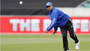 Kuldeep Yadav in blue training gear bowling during Team India’s practice session on the cricket field