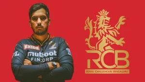 Malolan Rangarajan in Royal Challengers Bengaluru (RCB) attire posing with arms crossed next to the official RCB logo on a red background.