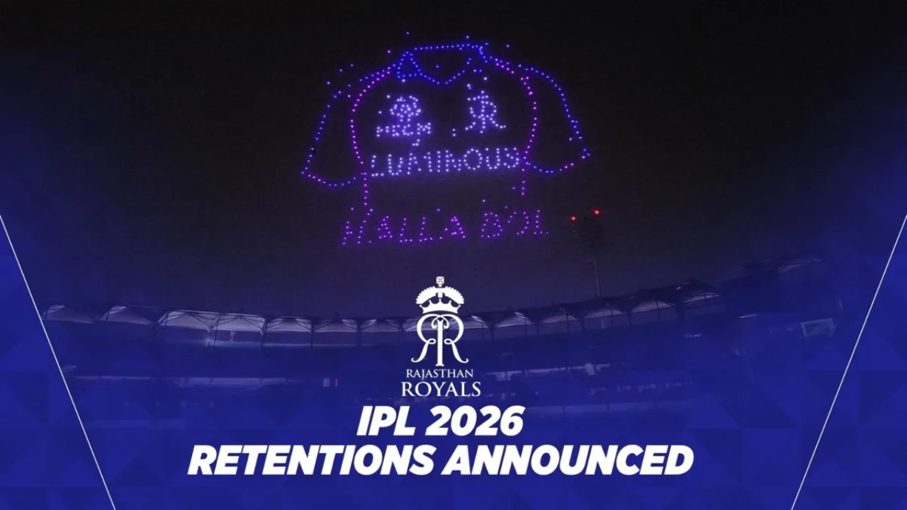 Drone light display of Rajasthan Royals jersey with "Luminous" and "Halla Bol" during IPL 2026 retentions announcement event at night in a stadium.