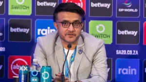Sourav Ganguly speaking at a SA20 2025 press conference with sponsor logos in the background.