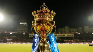TATA Women's Premier League trophy displayed on the cricket ground under stadium lights