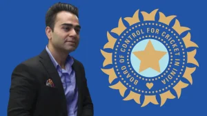 Vikas Kohli in a formal suit standing beside the Board of Control for Cricket in India (BCCI) logo on a blue background.