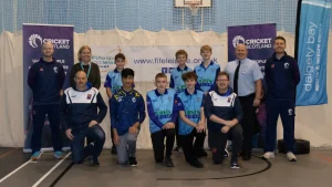 Youth cricket players and coaches at an indoor Cricket Scotland and Fife Leisure Trust training session in Dalgety Bay Sports Centre