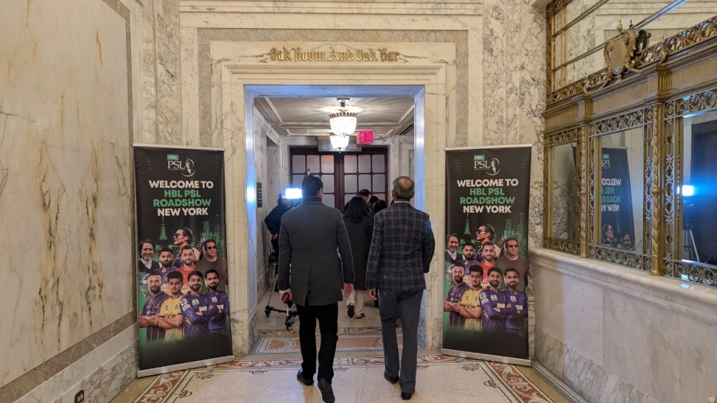 Entrance to the HBL PSL Roadshow 2025 in New York at the Plaza Hotel’s Oak Room, with event banners featuring PSL players on both sides of the hallway