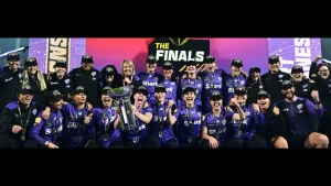 Hobart Hurricanes women's cricket team celebrating WBBL11 championship victory with trophy and medals on stage.
