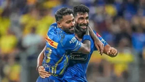 Jasprit Bumrah and Hardik Pandya celebrating in Mumbai Indians jersey during an IPL match
