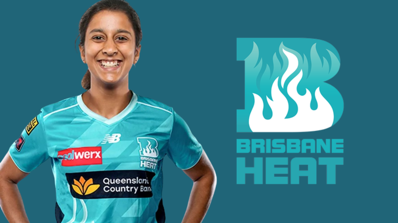 Jemimah Rodrigues smiling in Brisbane Heat jersey with the Brisbane Heat team logo on a teal background