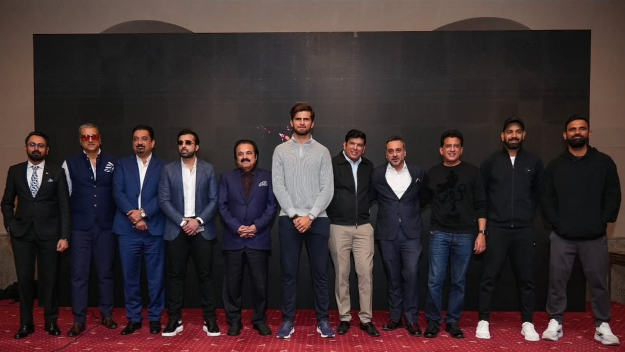 Shaheen Shah Afridi, Haris Rauf, Fakhar Zaman, Atif Rana, Sameen Rana, and Salman Naseer posing with other attendees at a Lahore Qalandars event.