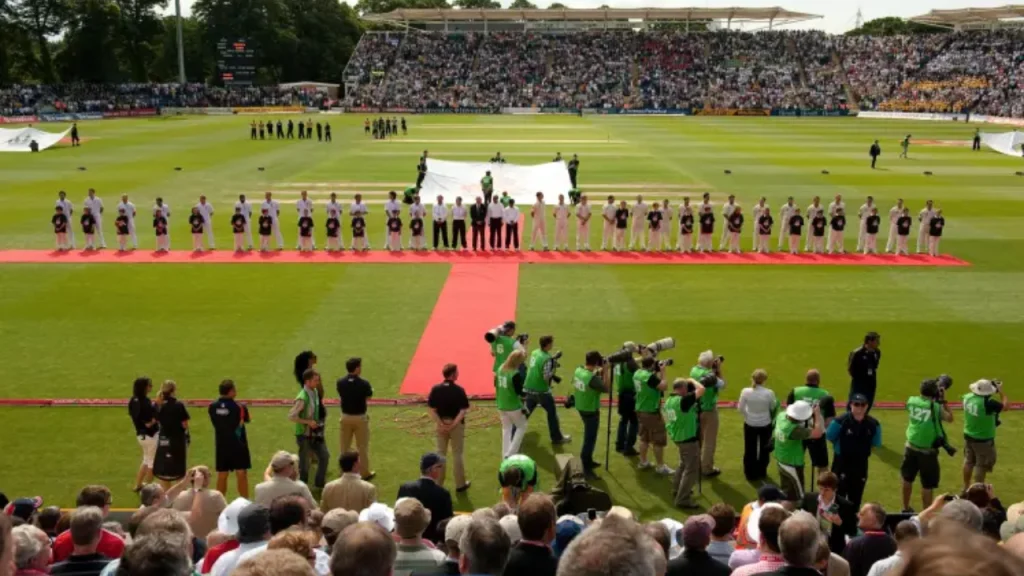 Opening ceremony at Sophia Gardens for an Ashes Test between England and Australia, with players lined up and photographers capturing the moment