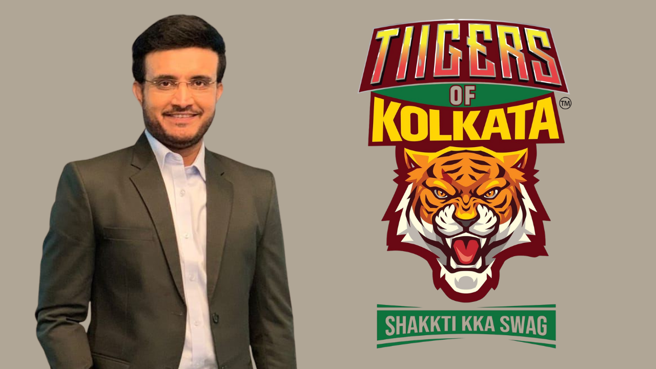 Sourav Ganguly standing beside Tigers of Kolkata team logo with tagline Shakkti Kka Swag on beige background